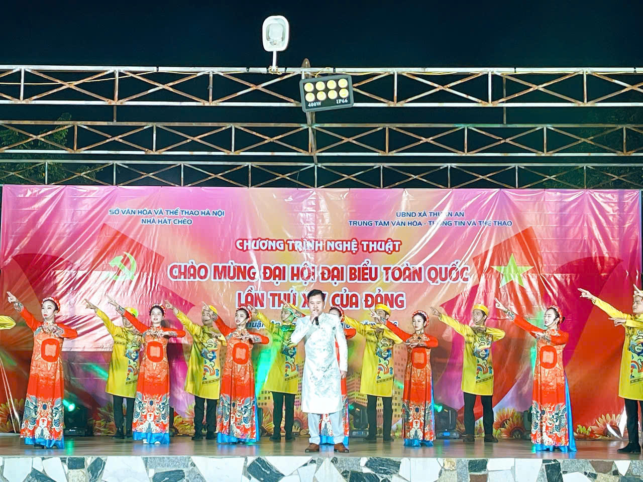 A group of people performing on a stage  AI-generated content may be incorrect.