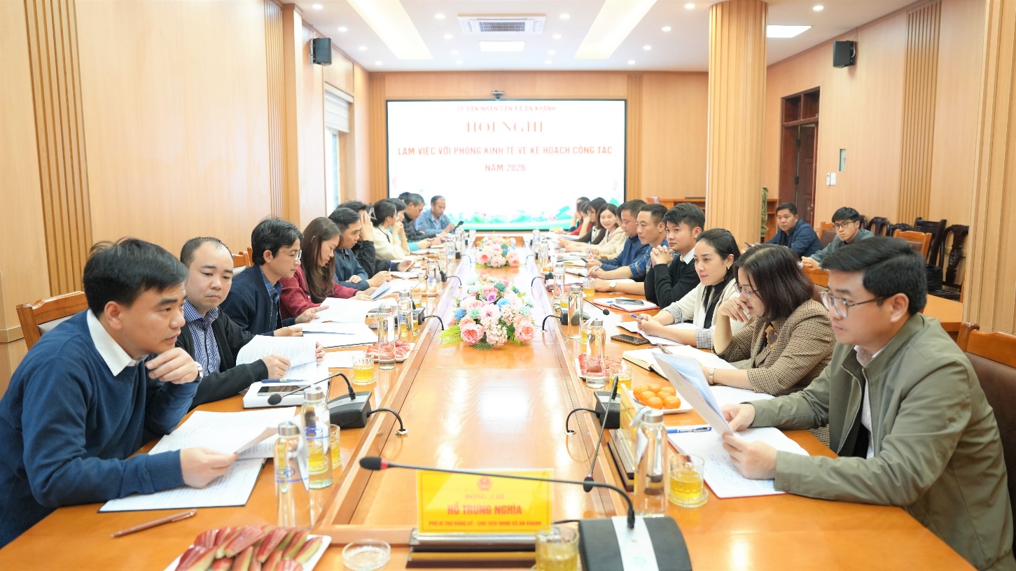 A group of people sitting at a table  AI-generated content may be incorrect.