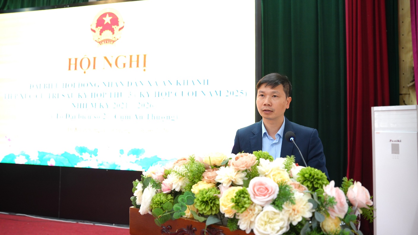 A person standing at a podium with flowers  AI-generated content may be incorrect.