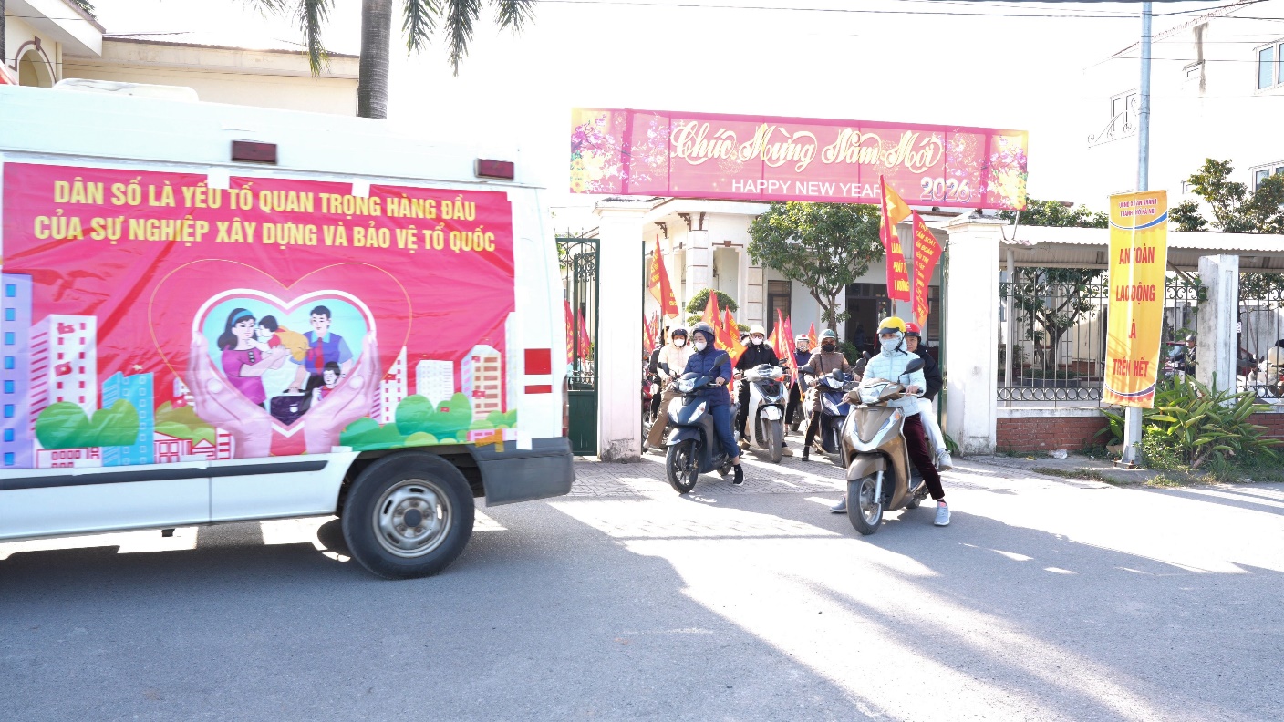 A white van with a red banner on it  AI-generated content may be incorrect.