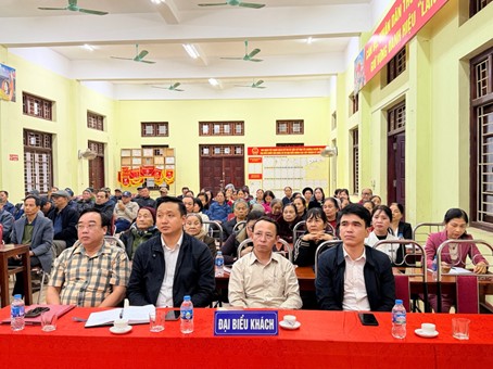 A group of people sitting at a table  AI-generated content may be incorrect.