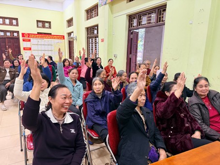 A group of people raising their hands  AI-generated content may be incorrect.