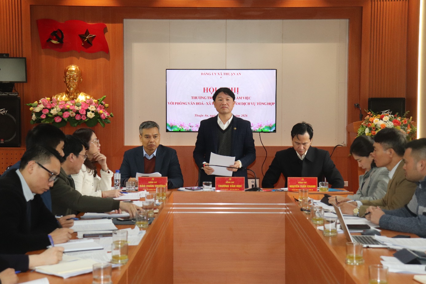 A group of people sitting at a table  AI-generated content may be incorrect.