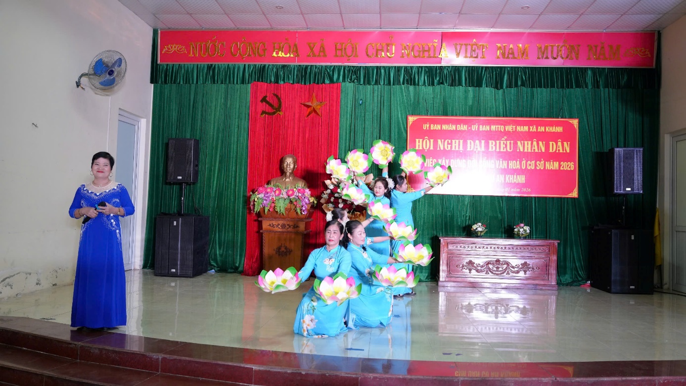 A group of women performing on a stage  AI-generated content may be incorrect.