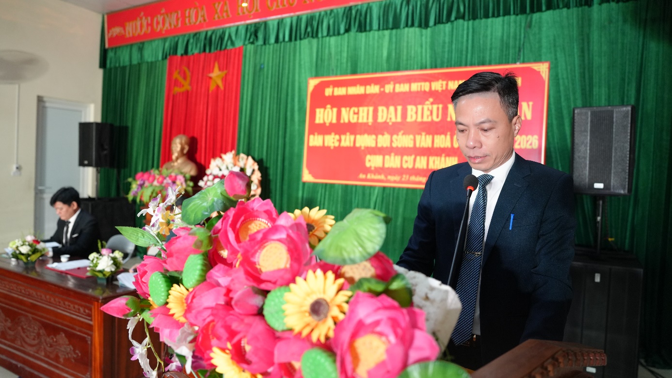 A person standing in front of a table with flowers  AI-generated content may be incorrect.