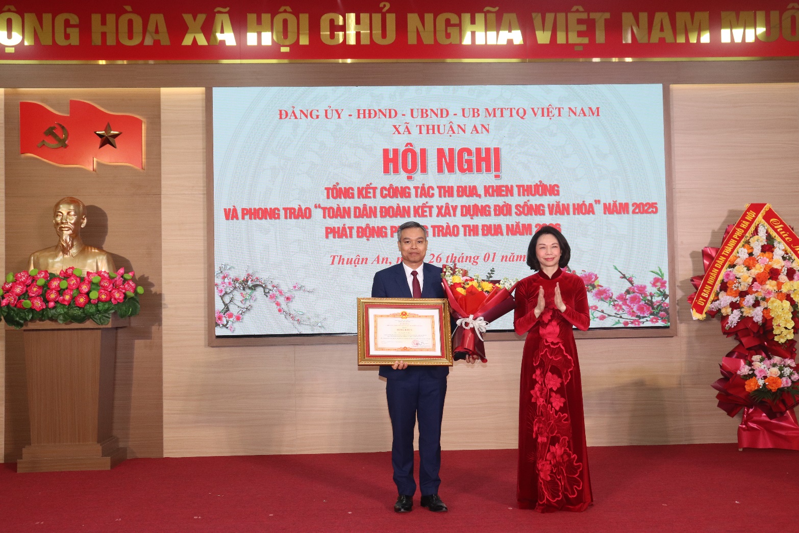 A person and person holding flowers and a frame  AI-generated content may be incorrect.