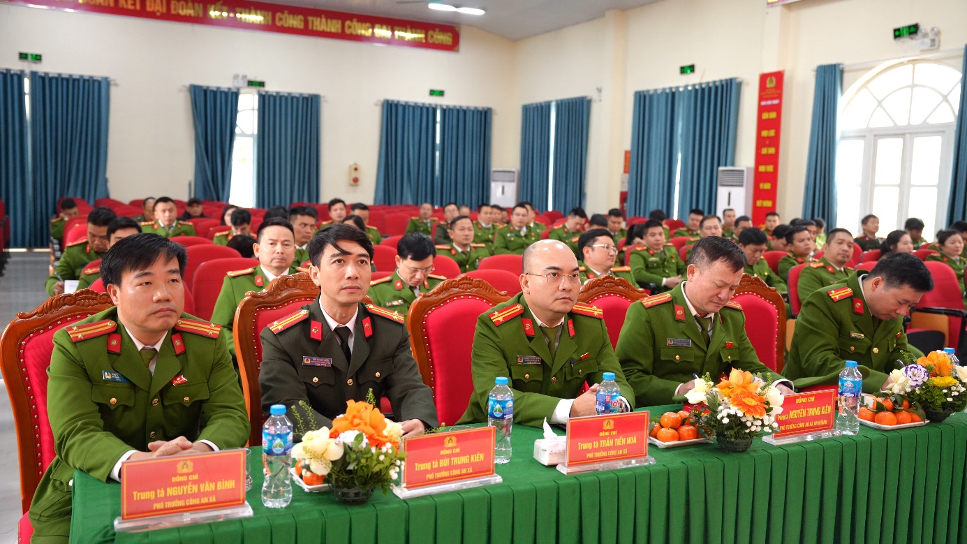 A group of people in military uniforms sitting at a table  AI-generated content may be incorrect.