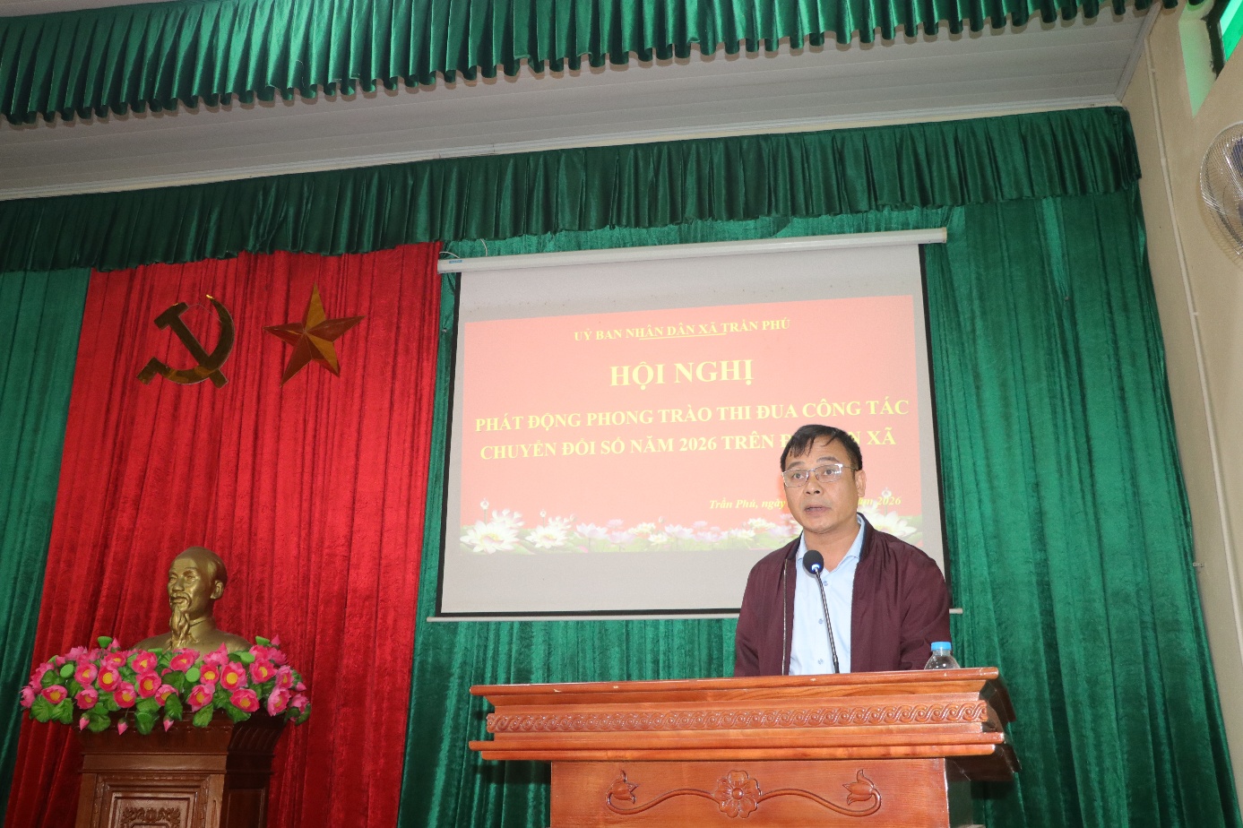 A person standing at a podium  AI-generated content may be incorrect.