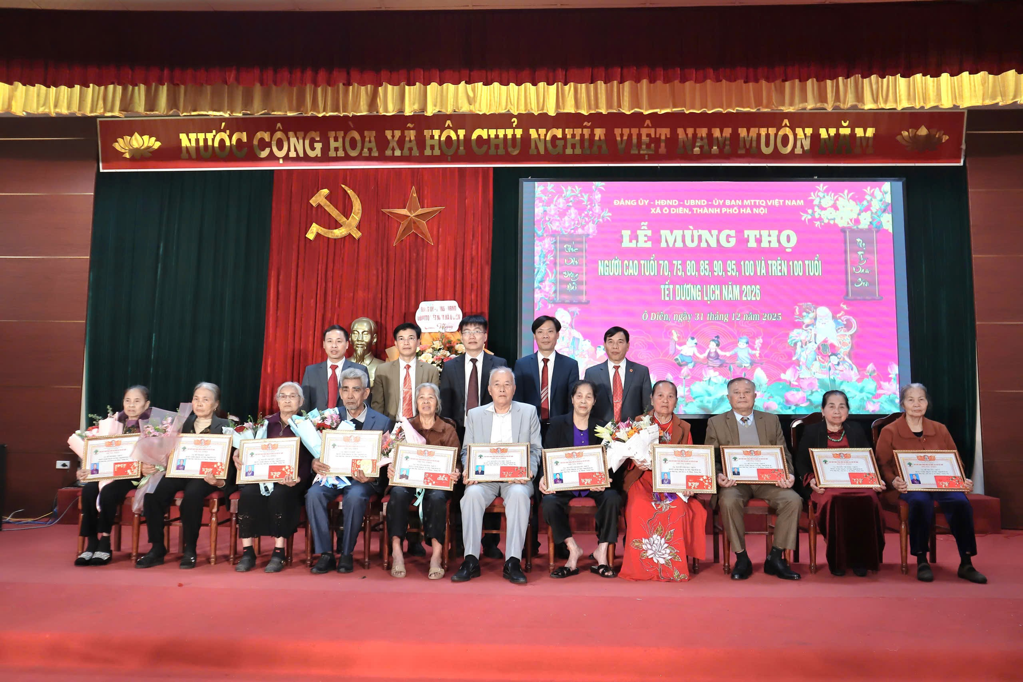 A group of people on a stage  Description automatically generated