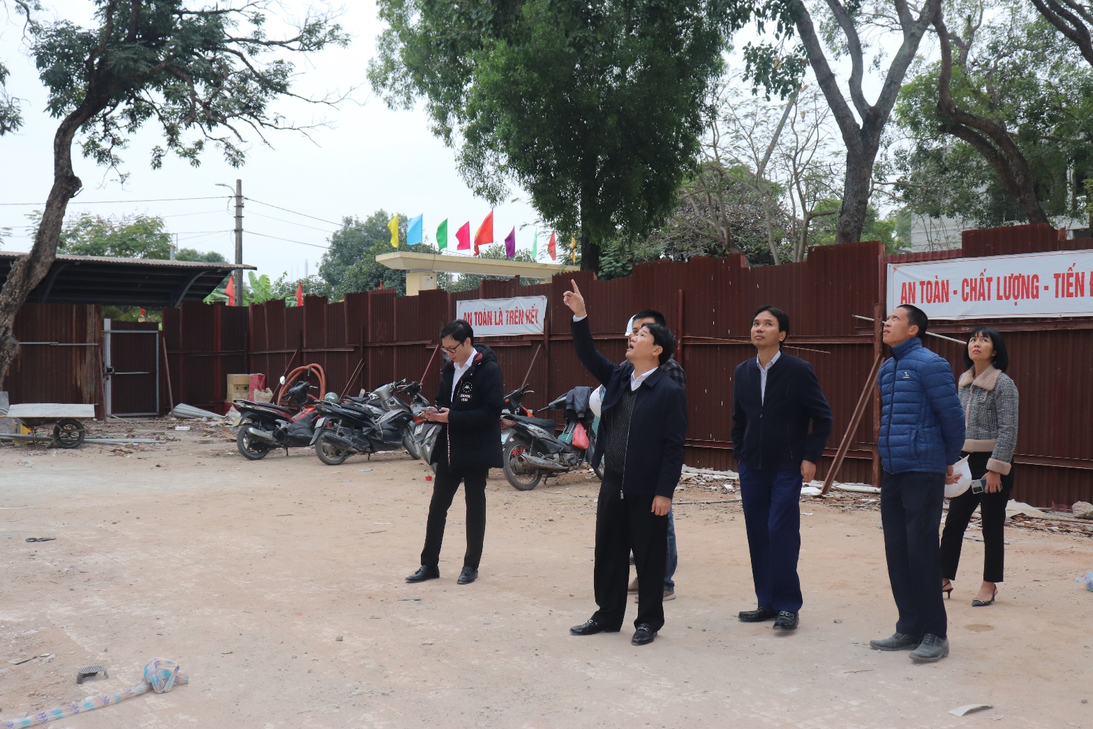 A group of men standing in a line  AI-generated content may be incorrect.