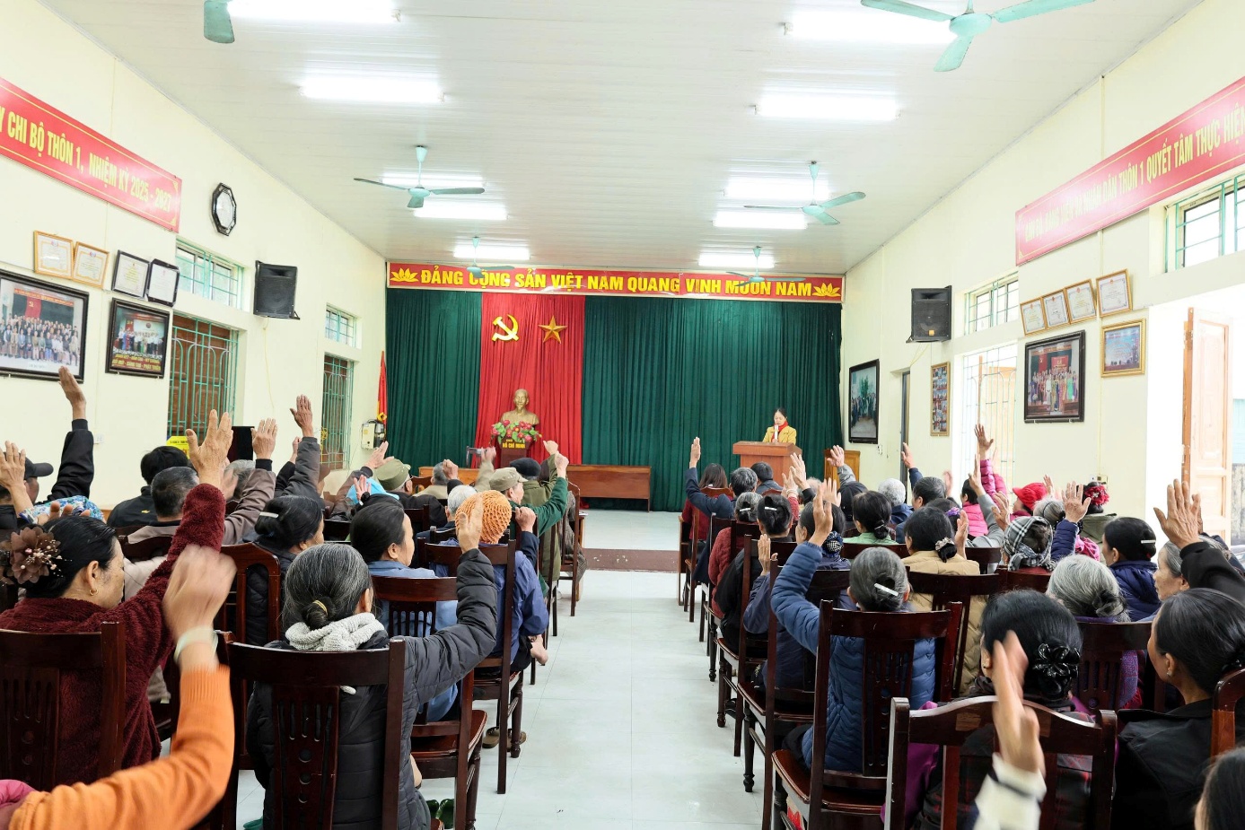 A group of people in a room  AI-generated content may be incorrect.