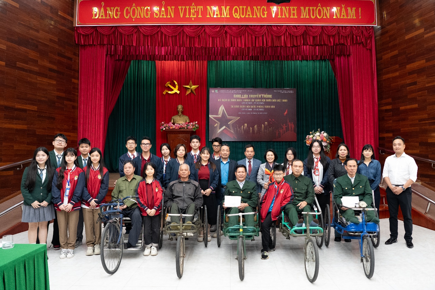 A group of people posing for a photo  Description automatically generated