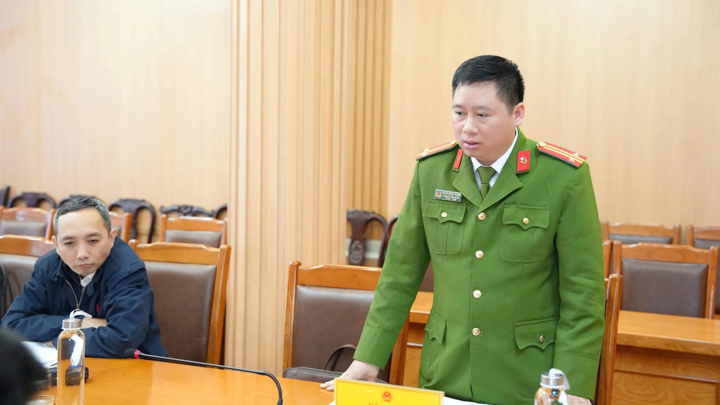 A person in a green uniform  AI-generated content may be incorrect.