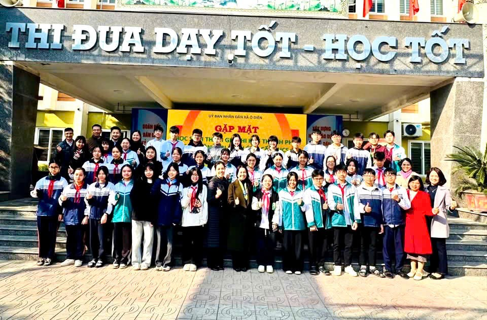 A group of people posing for a photo  Description automatically generated