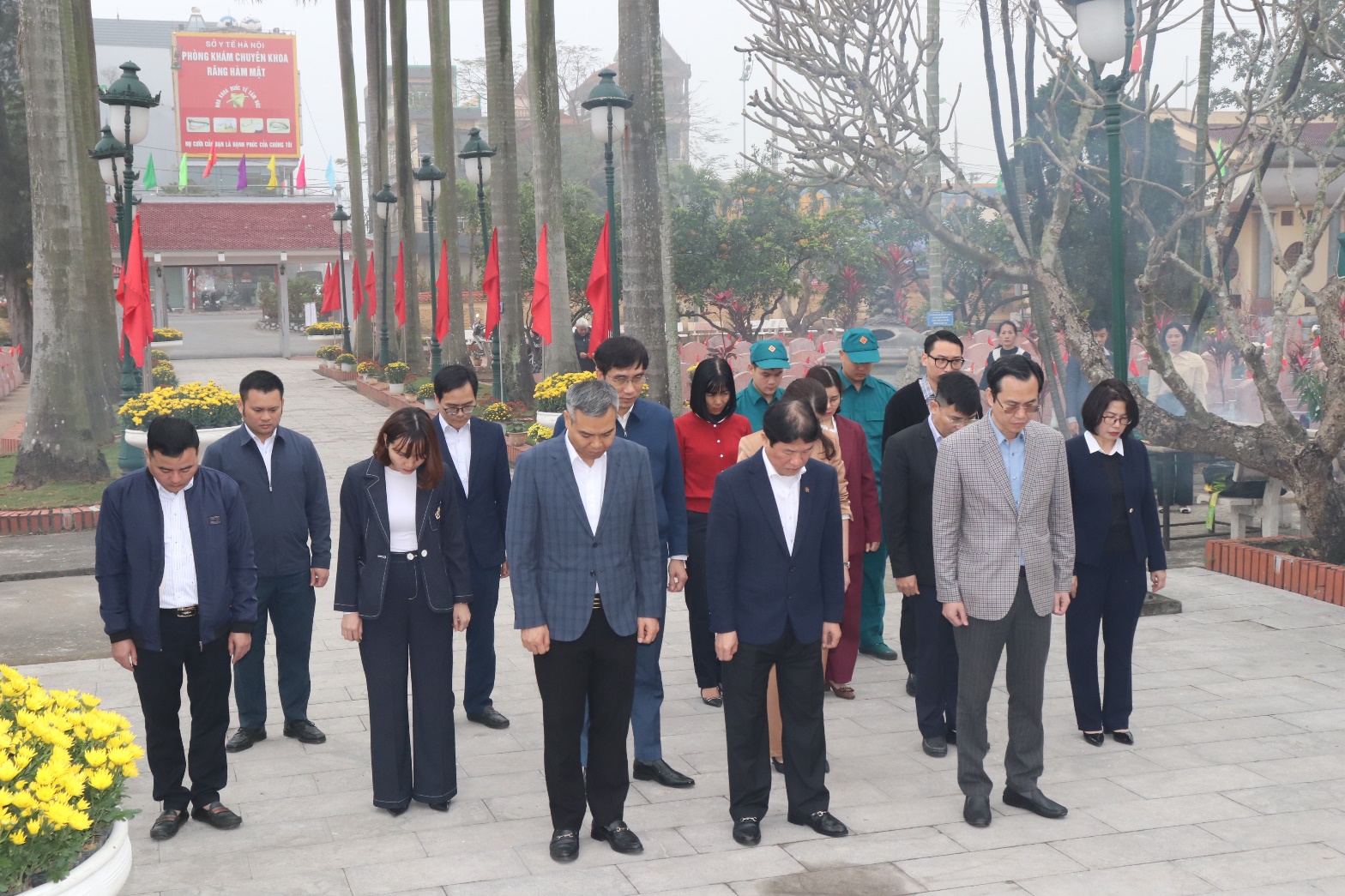 A group of people standing on a sidewalk  AI-generated content may be incorrect.
