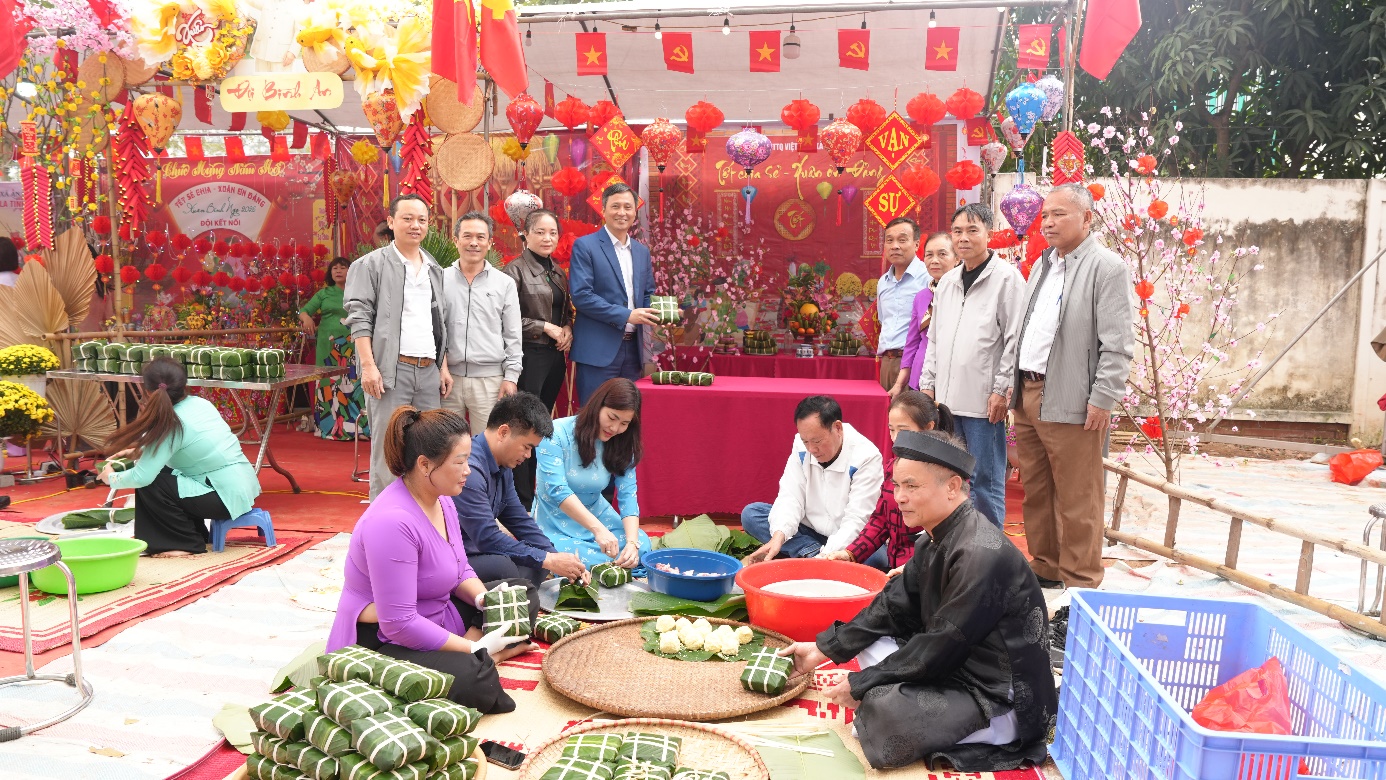 A group of people around a table  AI-generated content may be incorrect.