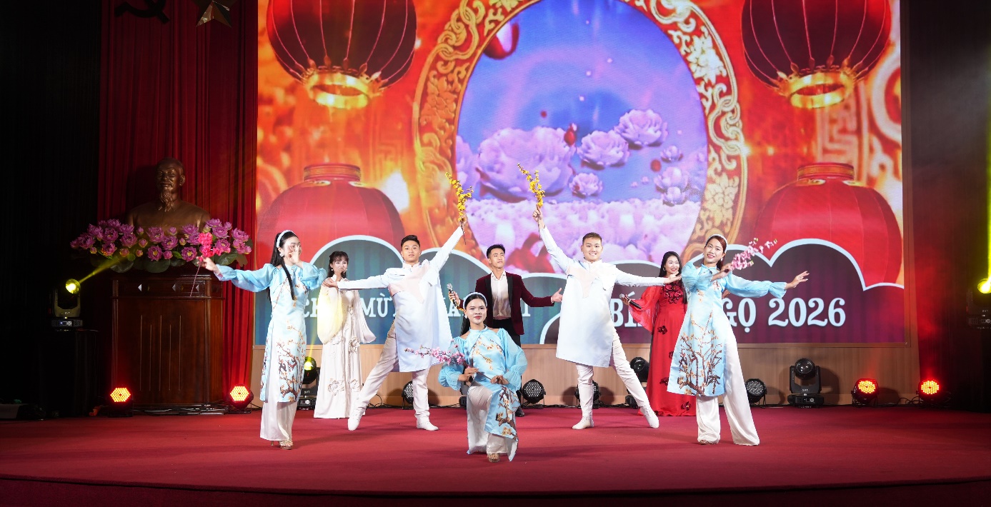 A group of people dancing on a stage  AI-generated content may be incorrect.