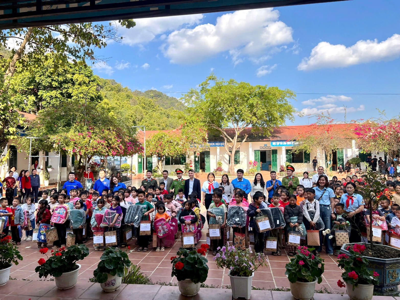 A group of people posing for a photo  AI-generated content may be incorrect.