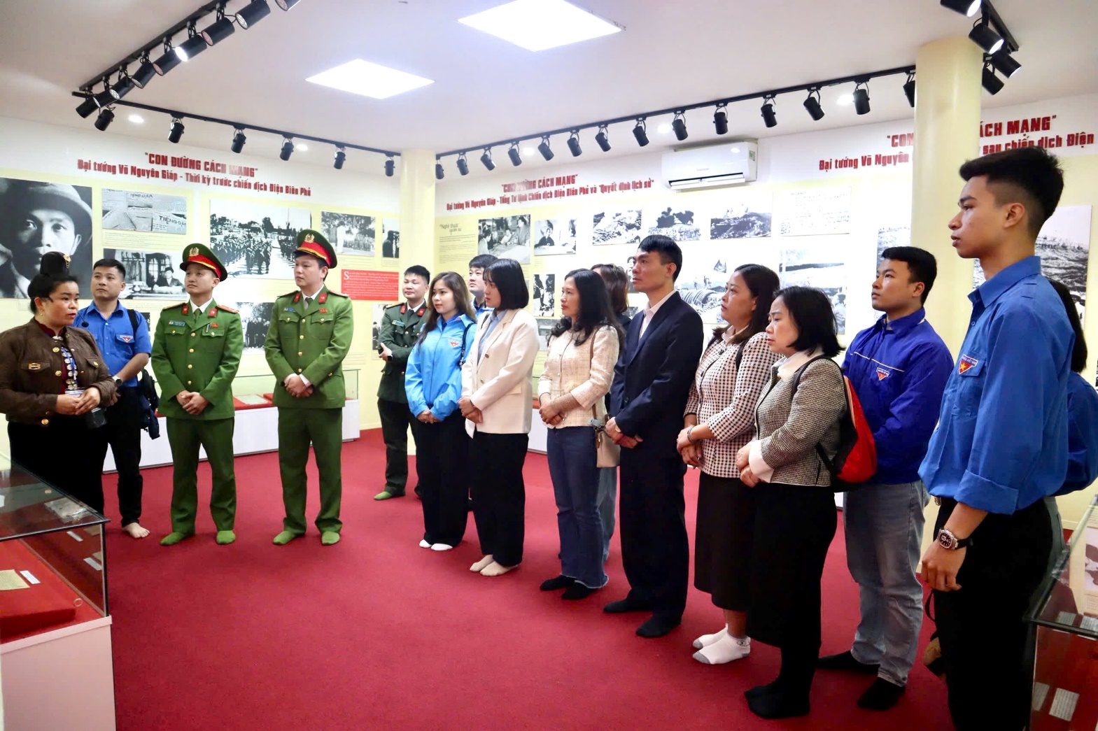 A group of people standing in a line  AI-generated content may be incorrect.