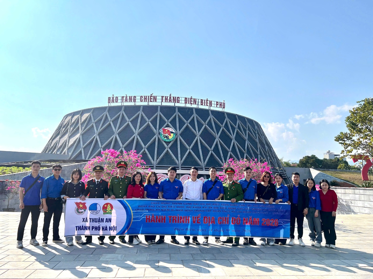 A group of people posing for a photo  AI-generated content may be incorrect.