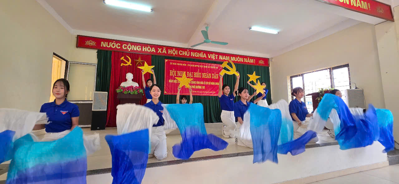 A group of people performing on stage  AI-generated content may be incorrect.