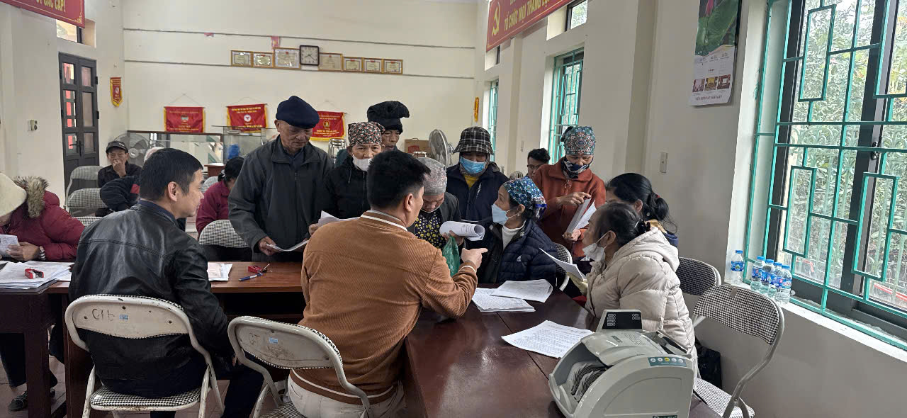 A group of people sitting around a table  AI-generated content may be incorrect.