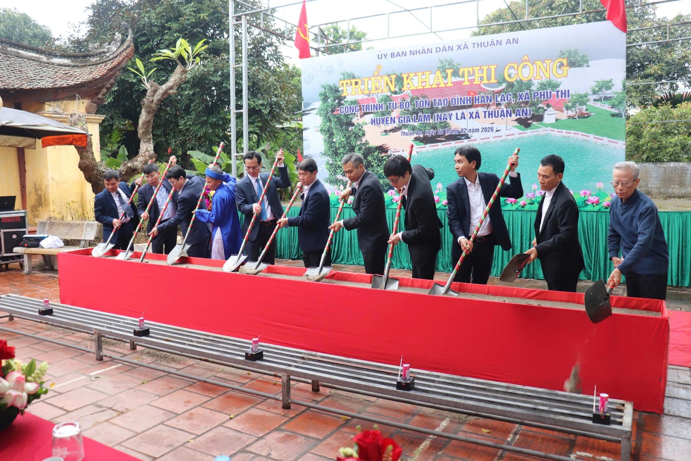 A group of people in suits holding shovels  AI-generated content may be incorrect.