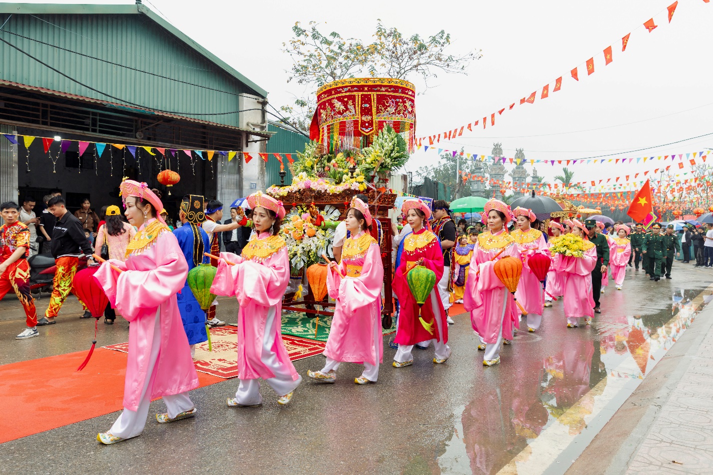 A group of people in pink dresses walking on a street  AI-generated content may be incorrect.