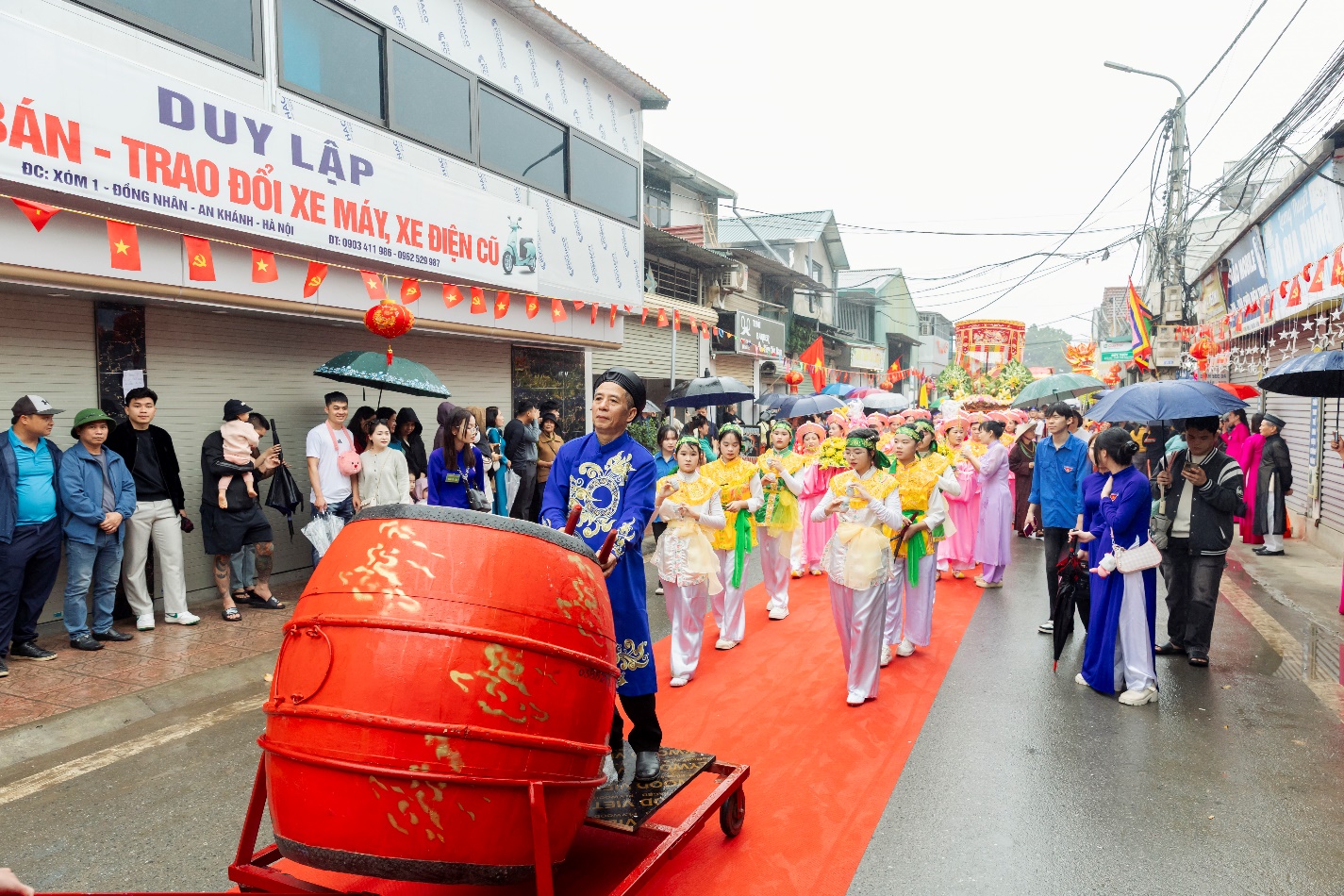 A group of people walking on a street  AI-generated content may be incorrect.