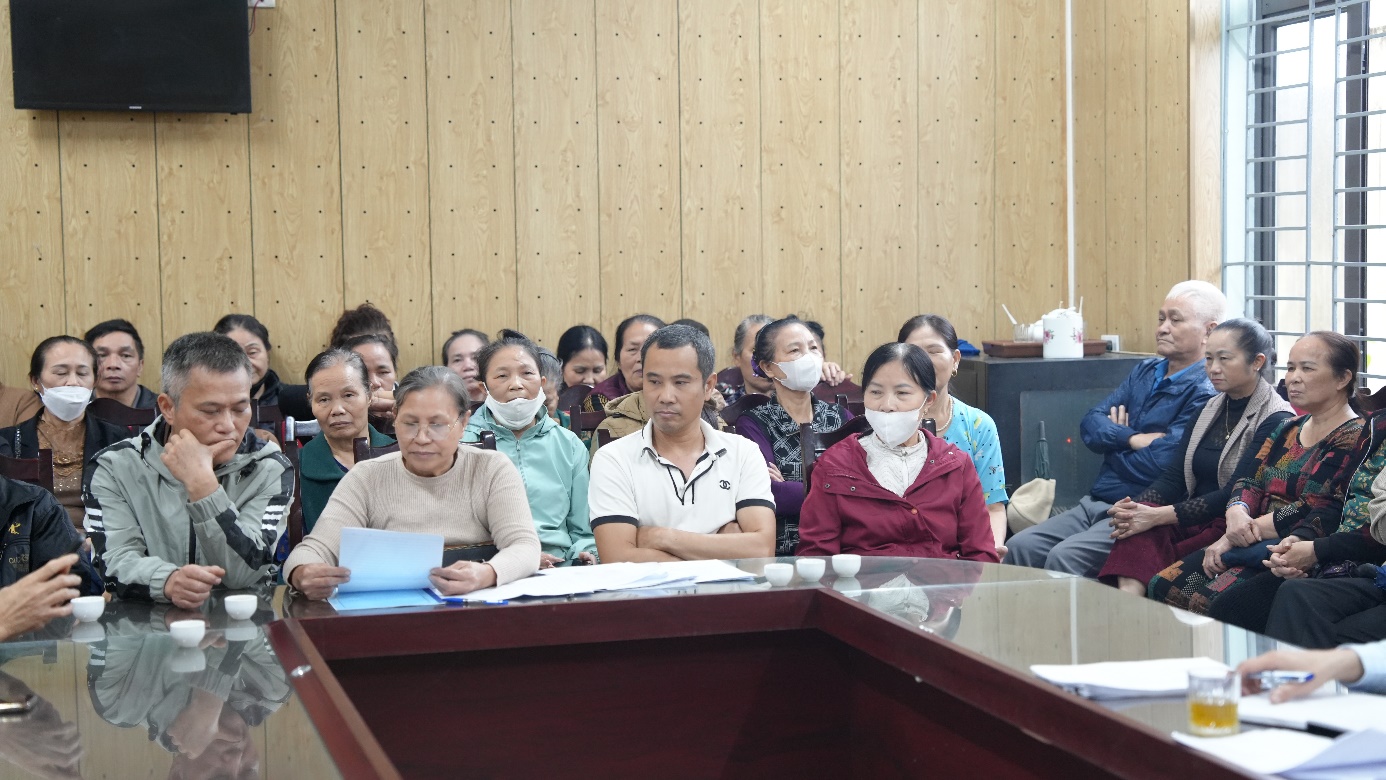 A group of people in a meeting  AI-generated content may be incorrect.