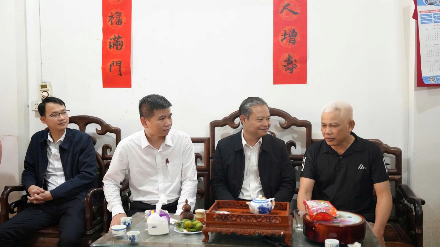 A group of men sitting at a table  AI-generated content may be incorrect.