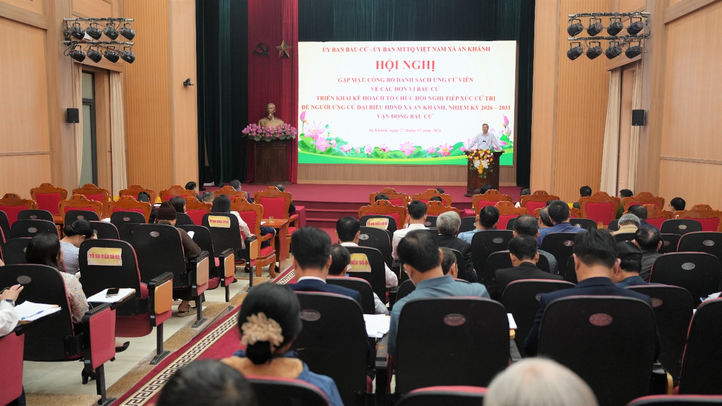 A person standing at a podium in front of a large screen  AI-generated content may be incorrect.