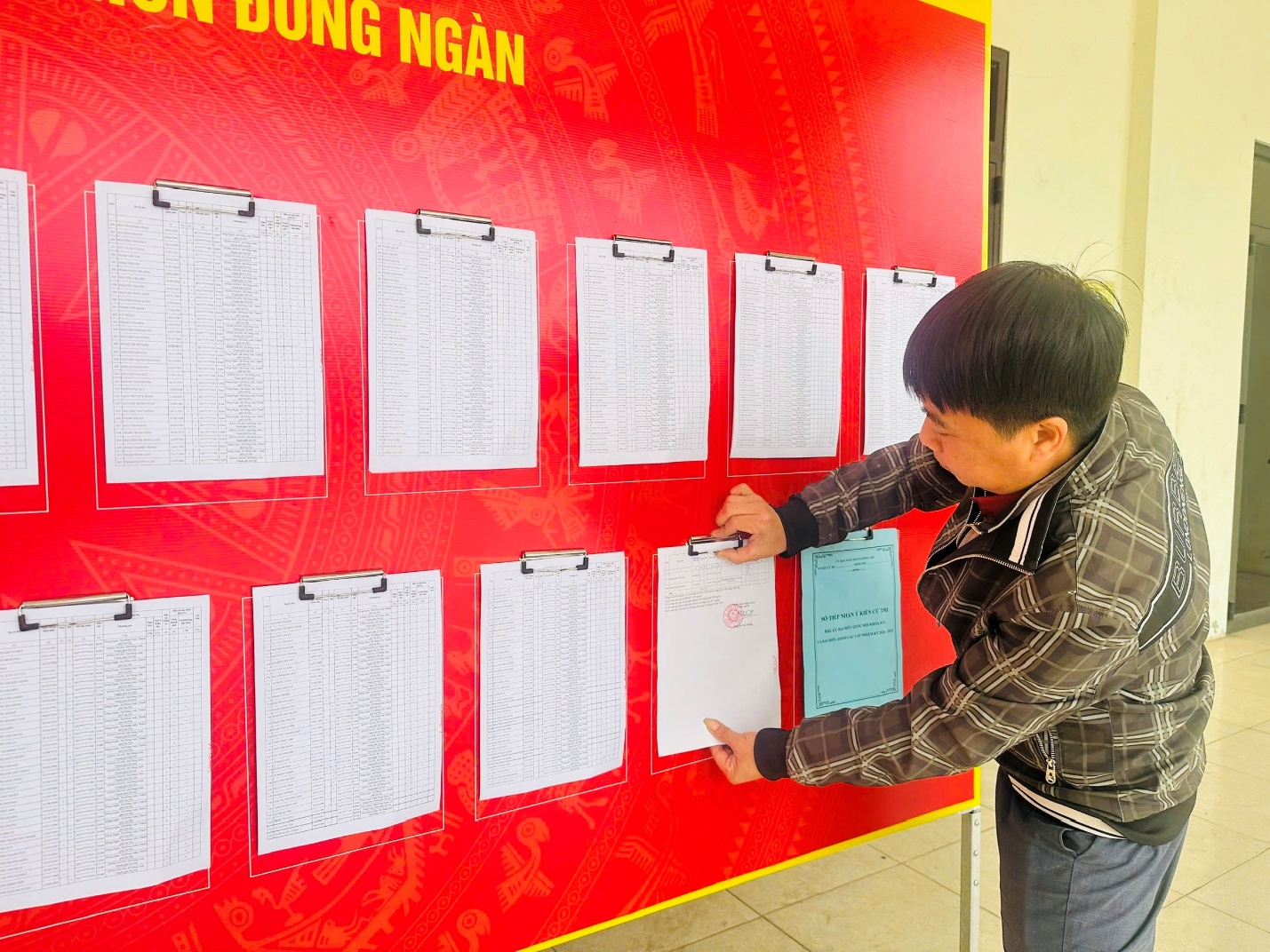 A person writing on a board  AI-generated content may be incorrect.