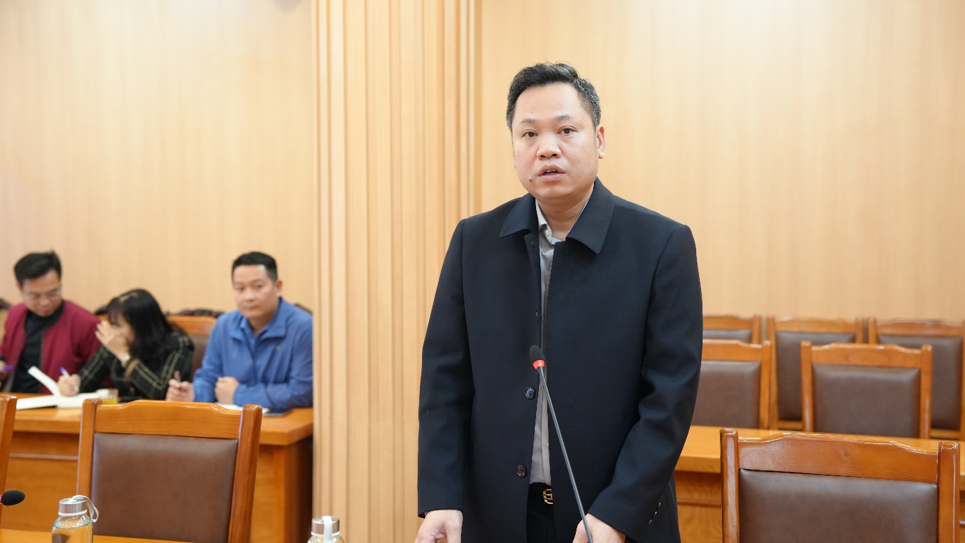 A person in a black coat  AI-generated content may be incorrect.