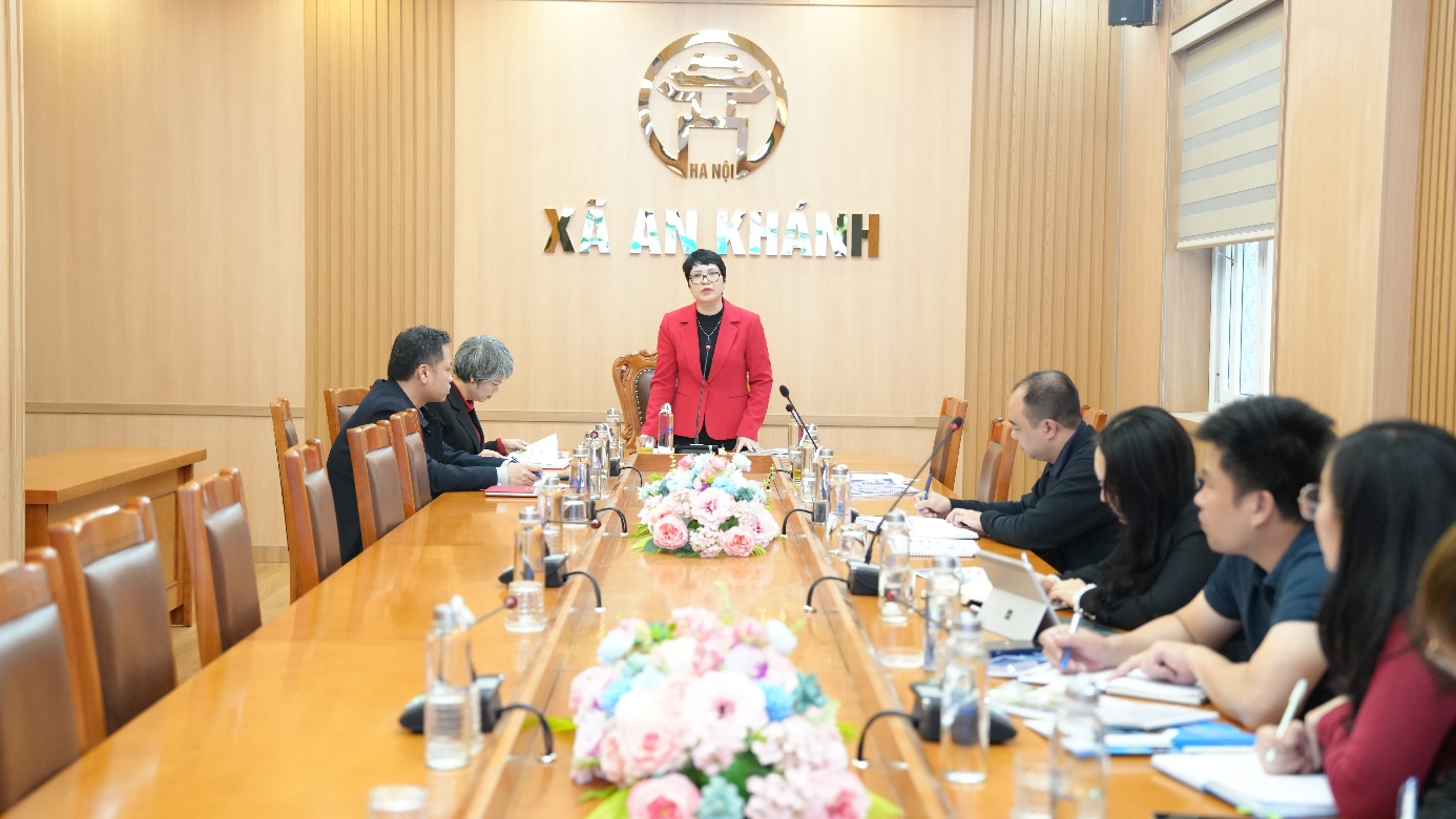 A group of people sitting around a table  AI-generated content may be incorrect.