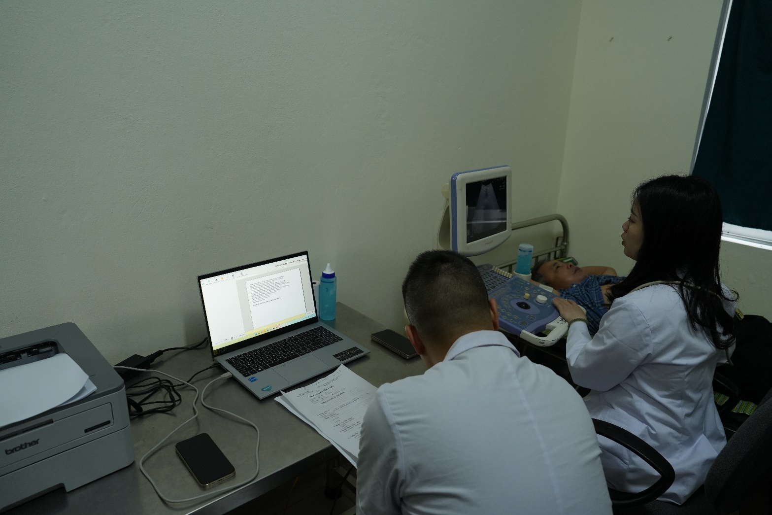 A person and person looking at a baby  AI-generated content may be incorrect.