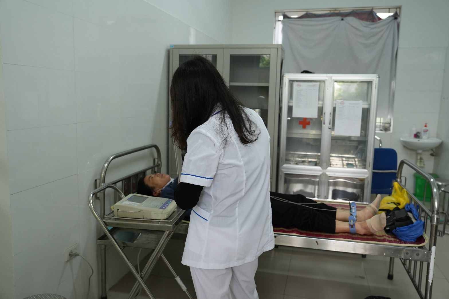 A doctor working on a patient  AI-generated content may be incorrect.