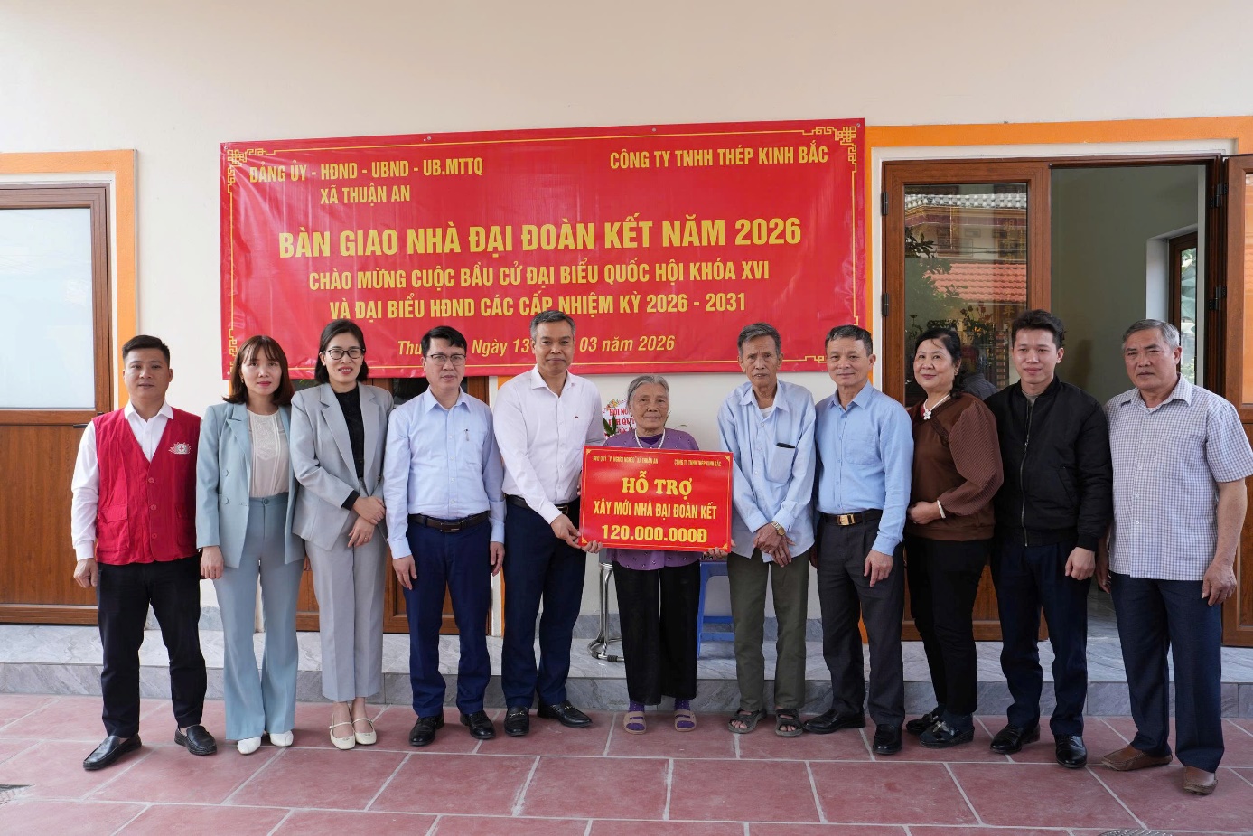 A group of people standing in front of a banner  AI-generated content may be incorrect.