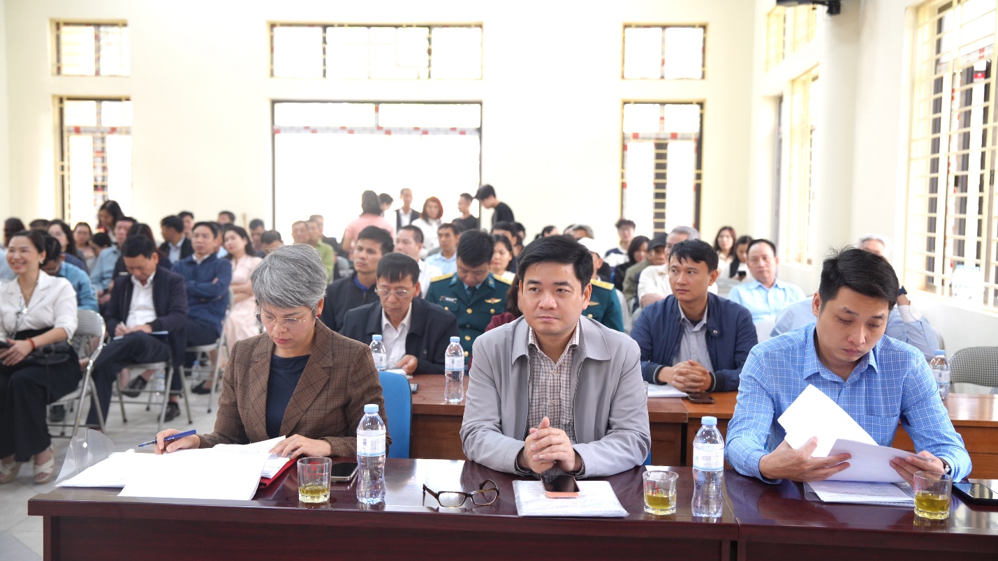 A group of people sitting at a table  AI-generated content may be incorrect.