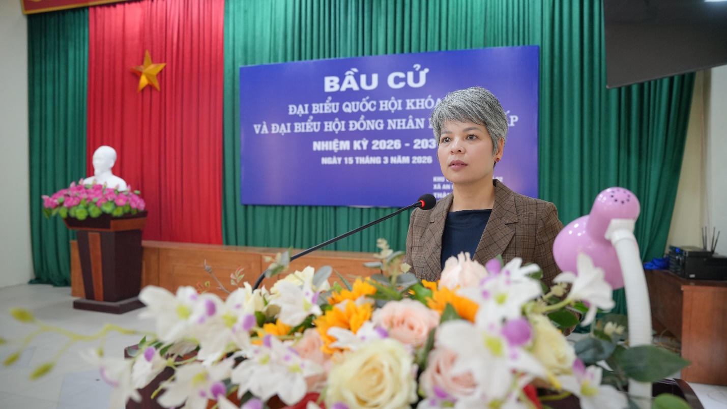 A person standing in front of a podium with a microphone  AI-generated content may be incorrect.