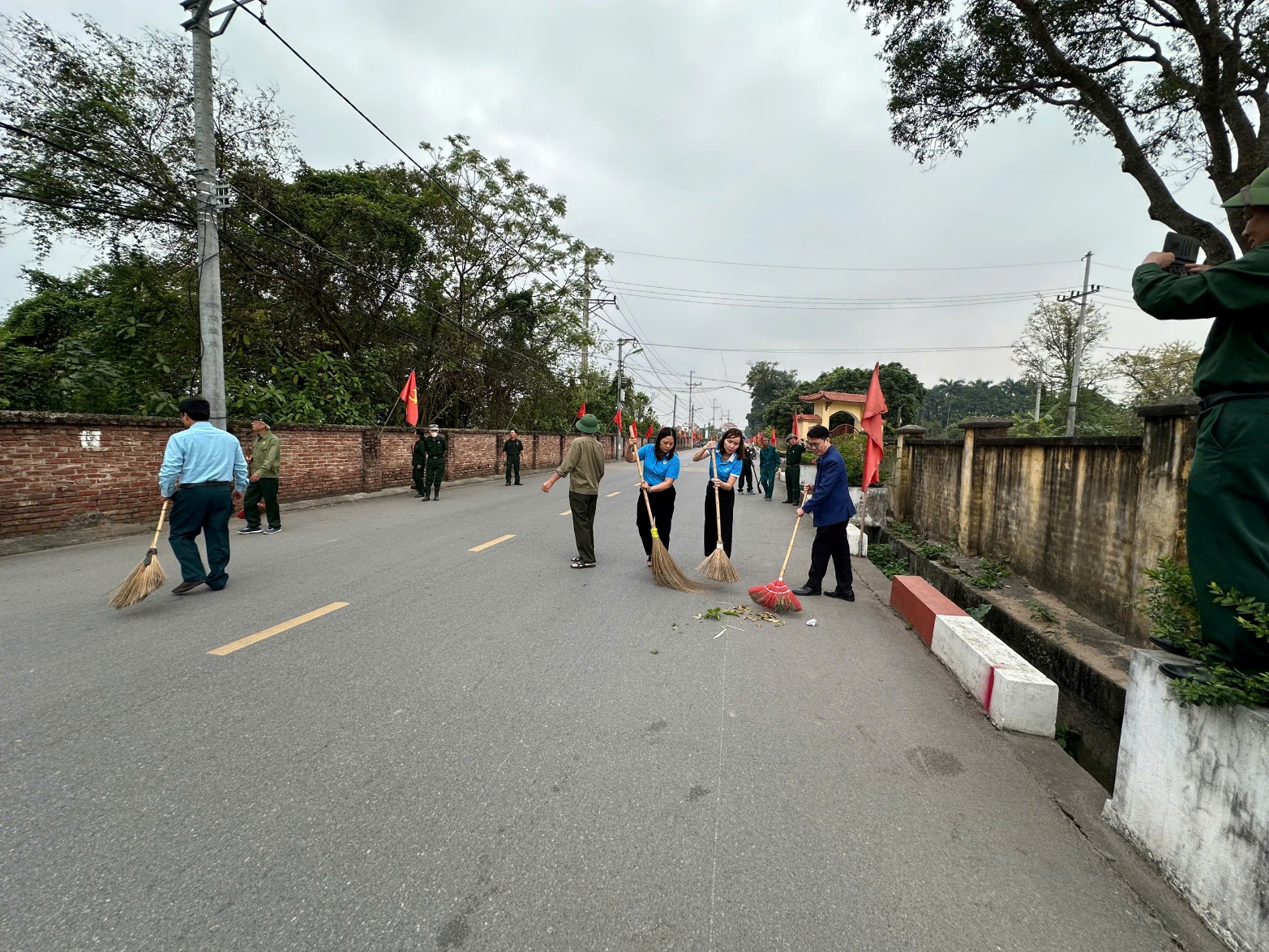 A group of people on a road  AI-generated content may be incorrect.