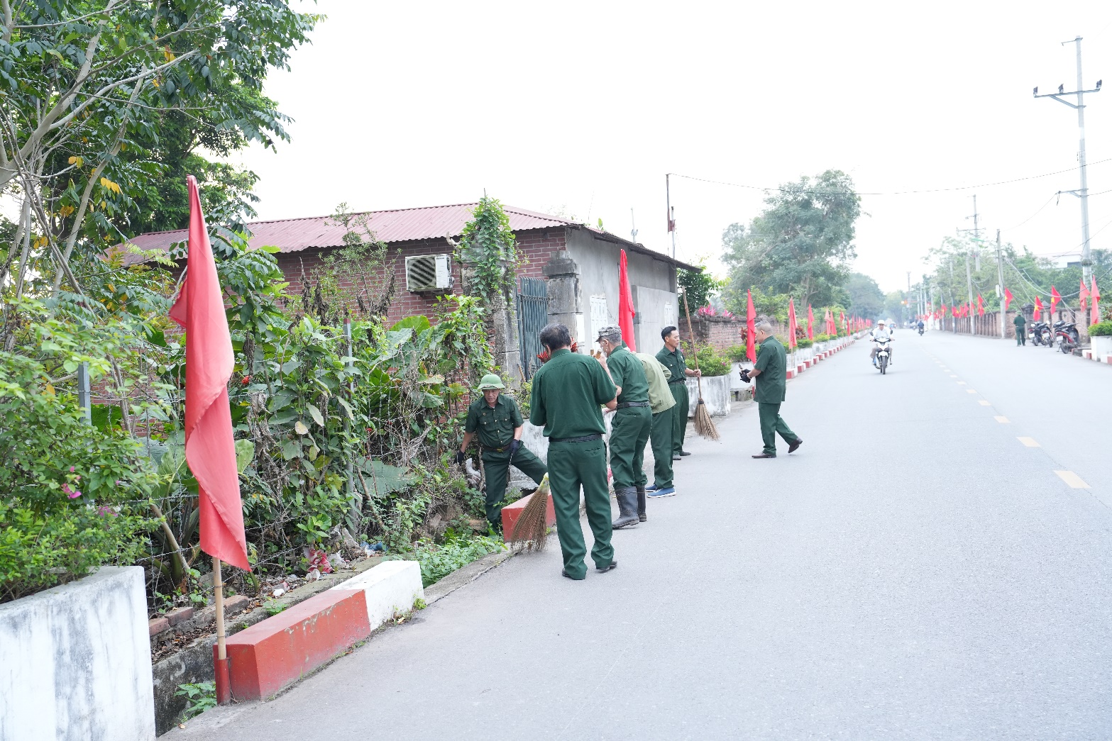 A group of men in uniform standing on the side of a road  AI-generated content may be incorrect.