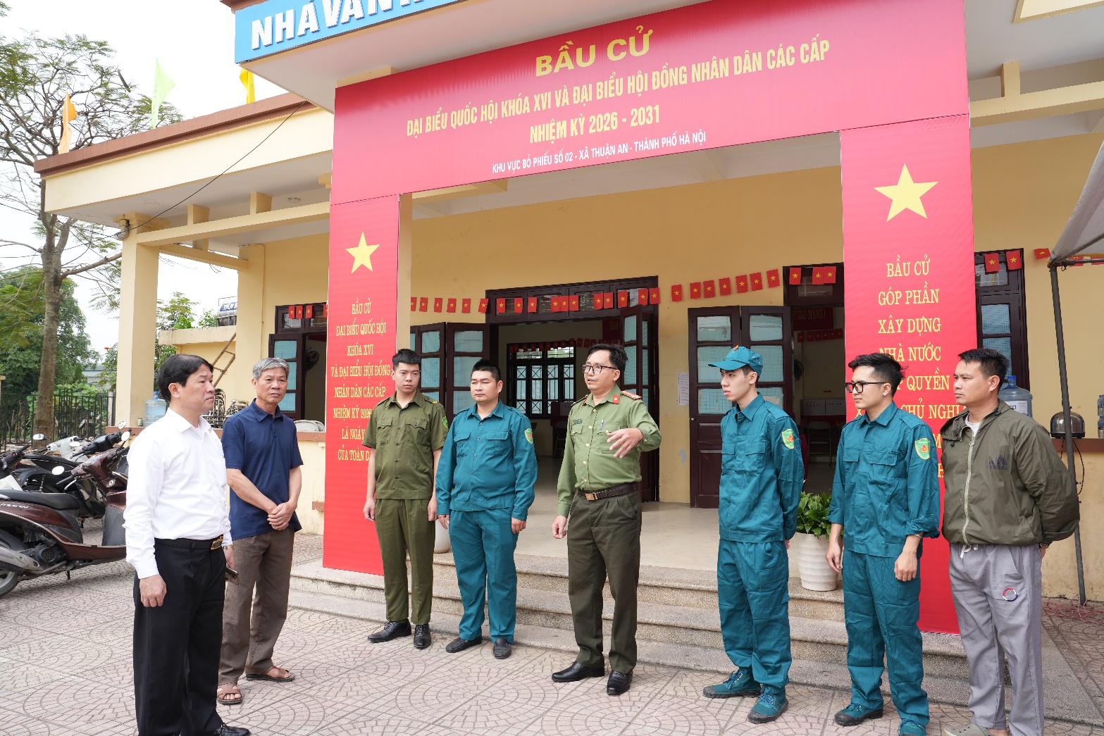 A group of people standing in front of a building  AI-generated content may be incorrect.