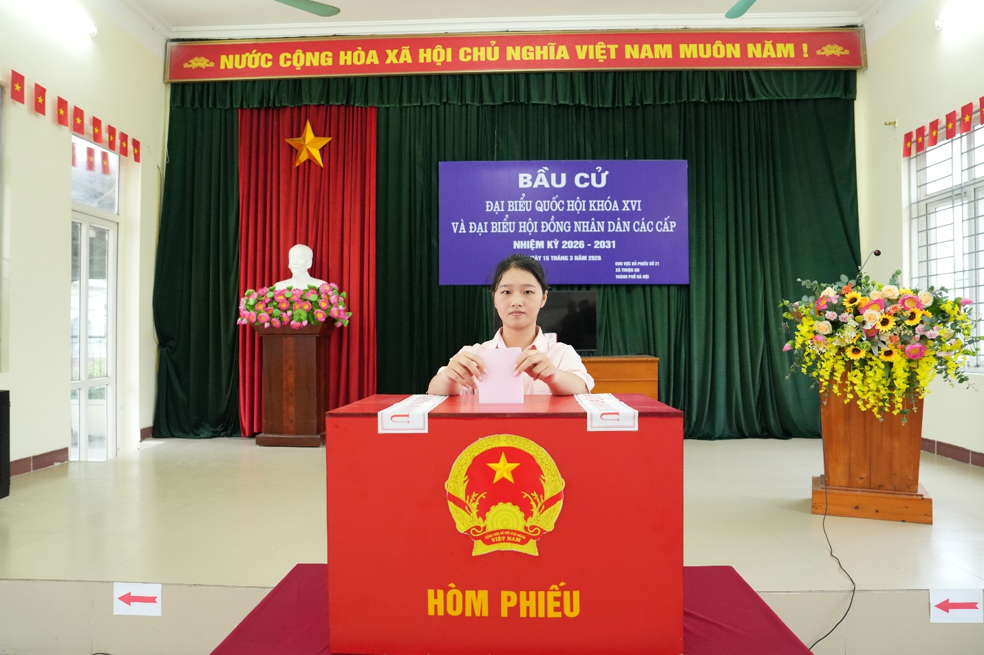 A person sitting at a podium  AI-generated content may be incorrect.