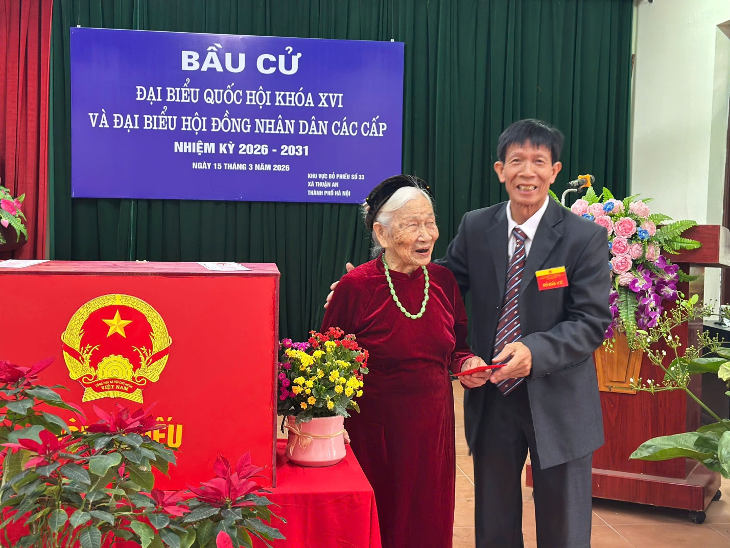 A person and person standing next to a table  AI-generated content may be incorrect.