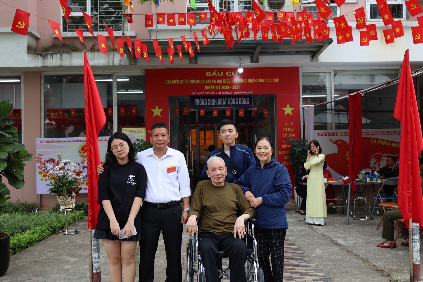 A group of people standing in front of a building  AI-generated content may be incorrect.