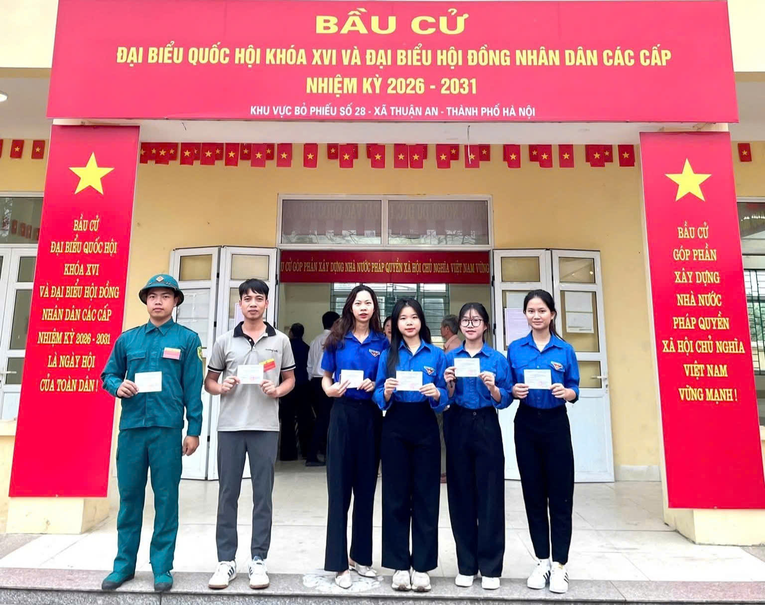 A group of people standing in front of a building  AI-generated content may be incorrect.