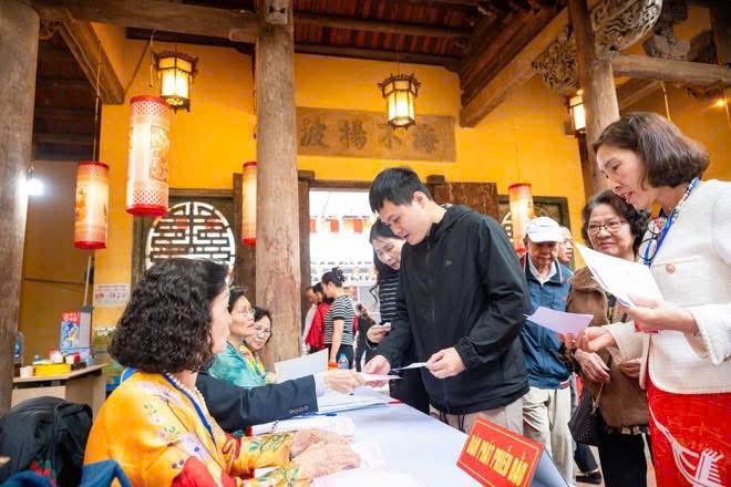 Người dân Hà Nội đi bầu cử tại các di tích lịch sử văn hóa- Ảnh 14.