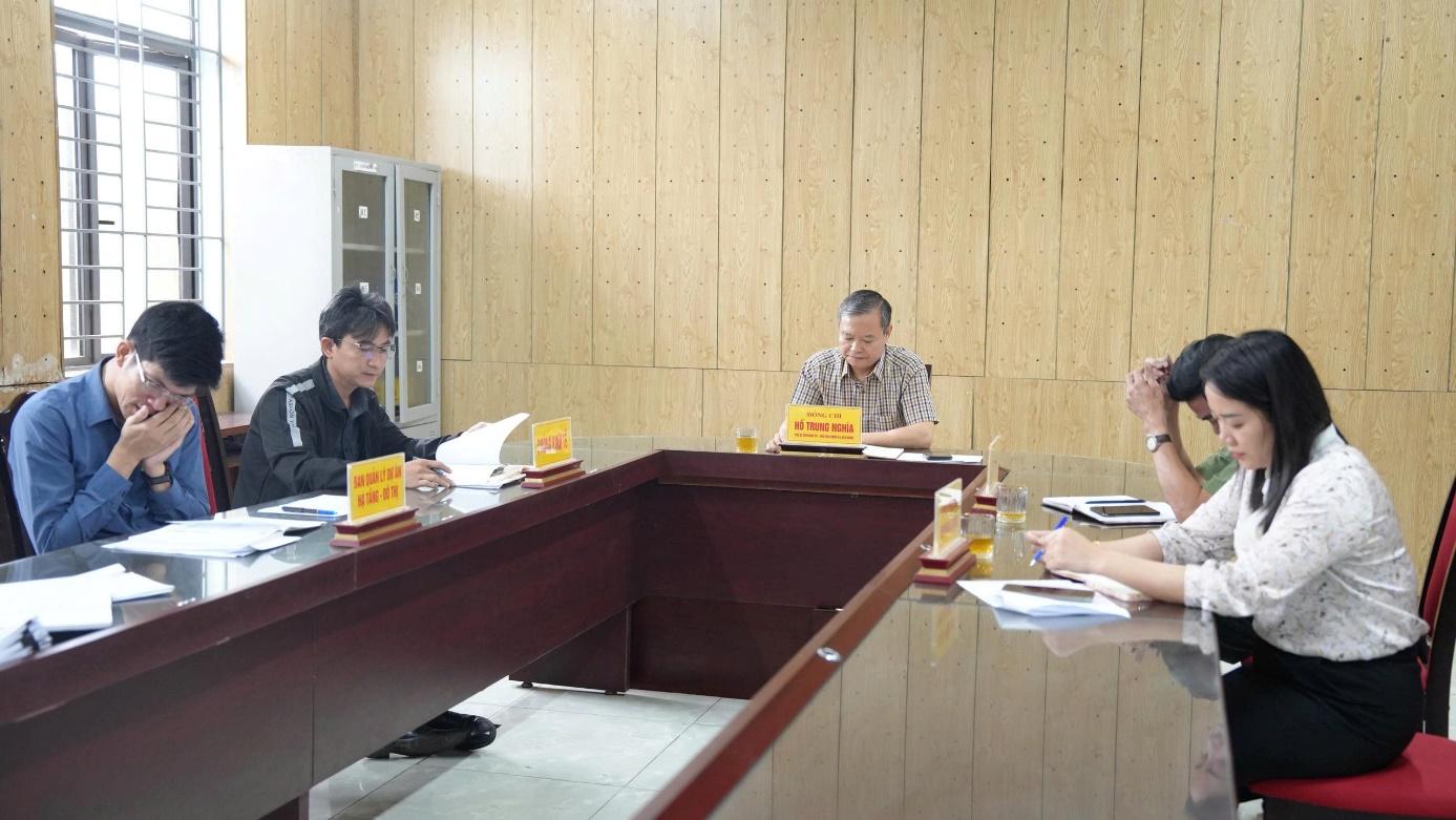 A group of people sitting at a table  AI-generated content may be incorrect.