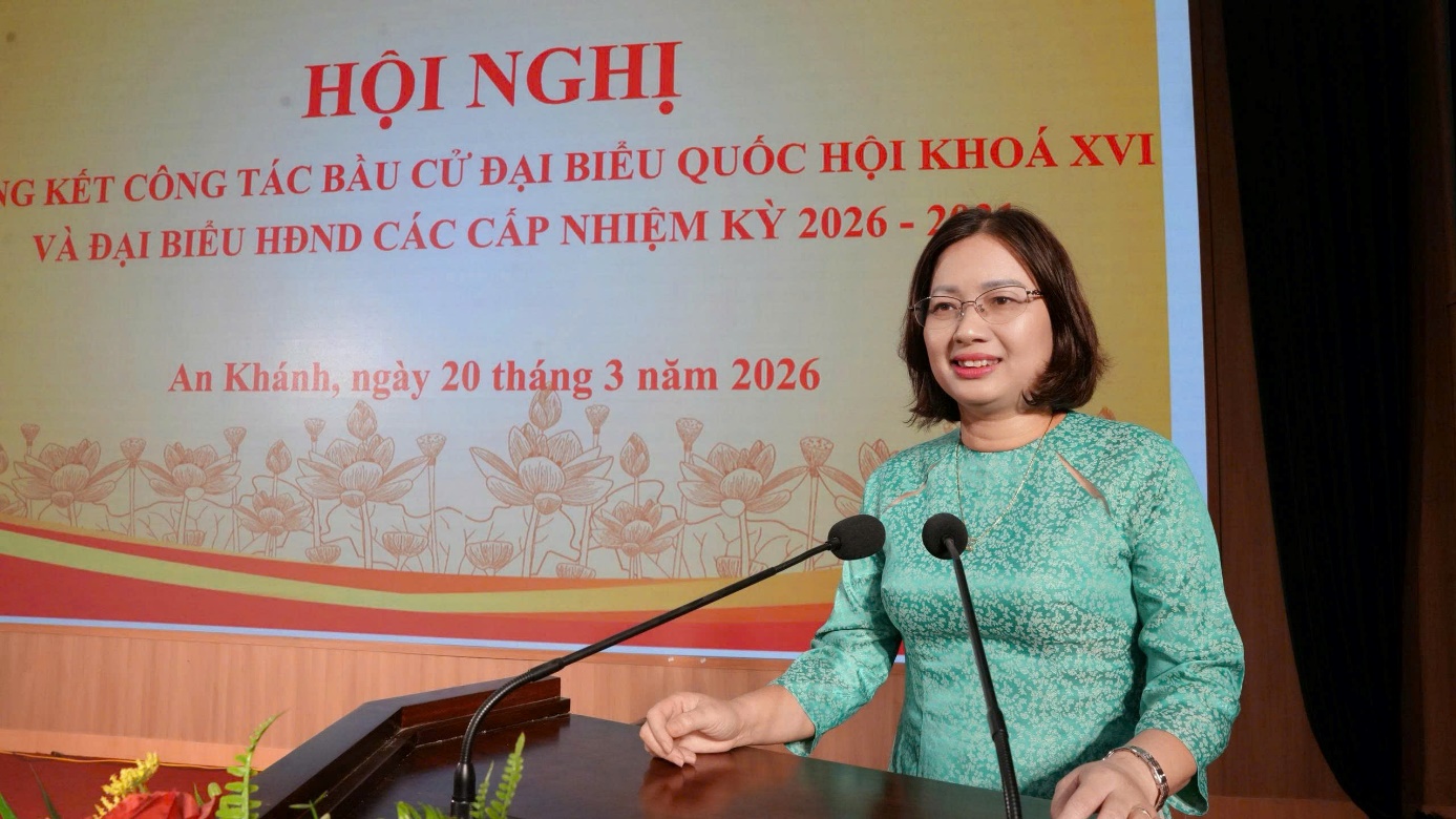 A person standing at a podium with microphones  AI-generated content may be incorrect.